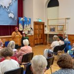 Audience listening to storytellers